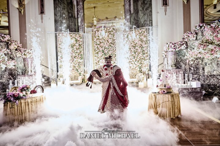 a groom standing in the fog